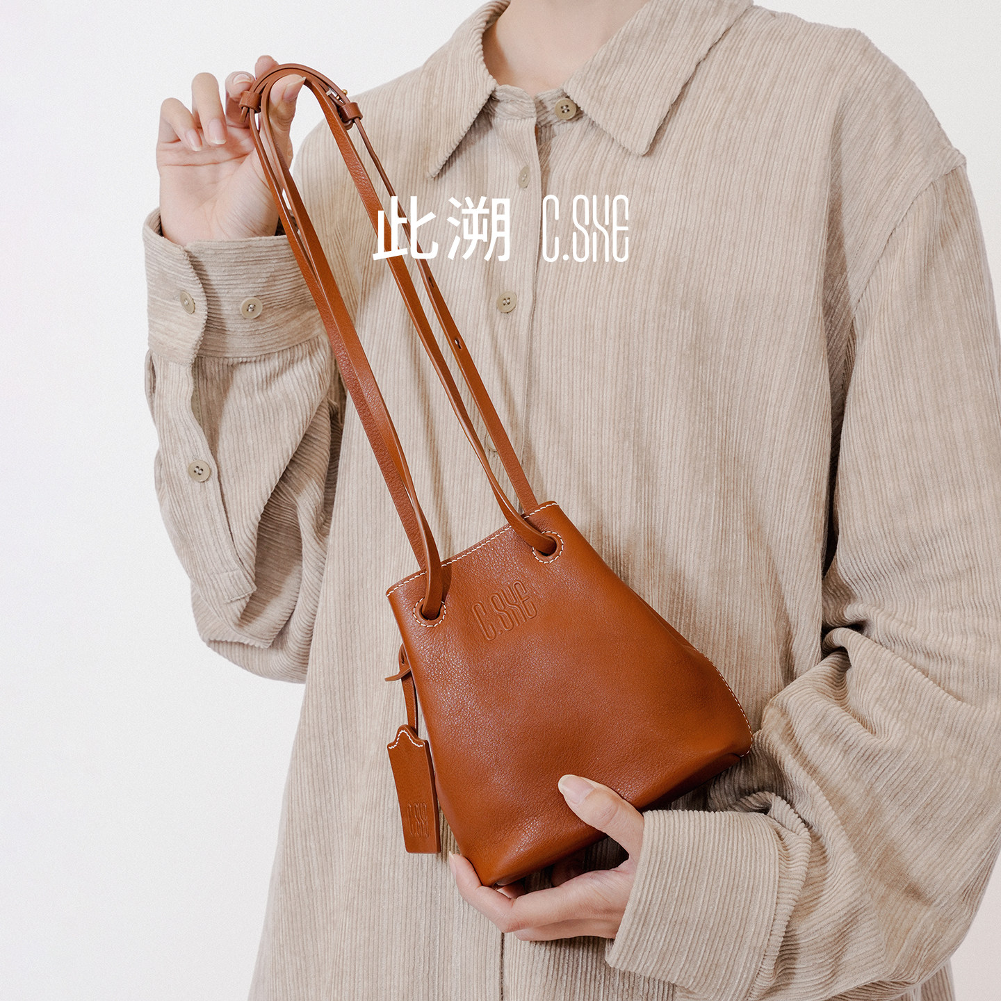 此溯手头层植鞣牛皮水桶包新中式原创简约设计手提斜挎单肩手机包