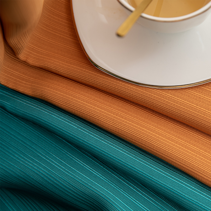 2021年新款全遮光窗帘撞色拼接孔雀绿橘黄色现代简约轻奢卧室布料