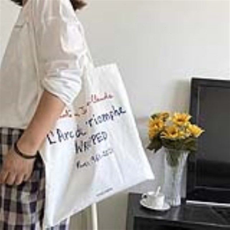字母白色单肩帆布包包女小众手提包学生环保购物袋U学生文艺帆布