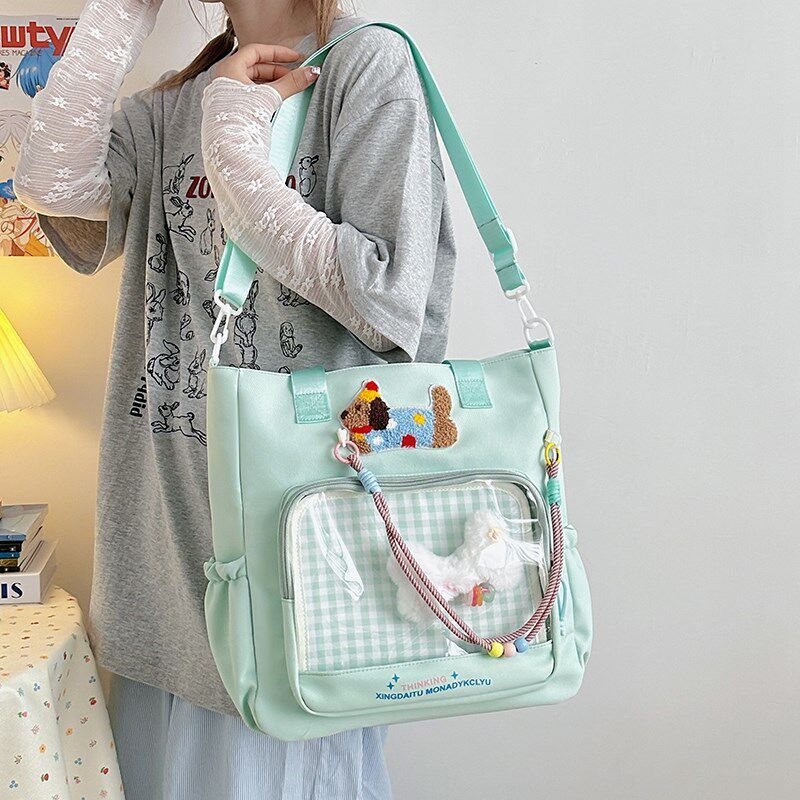 小学生单肩补习书包女孩手提拎书袋儿童外出背包补课班斜挎帆布包