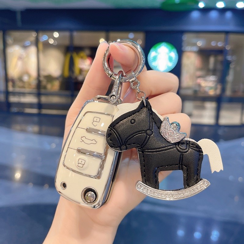 适用奥迪A3车钥匙套折叠A1 Q3 Q2L TT保护壳老款A6 Q7 Q5扣包女