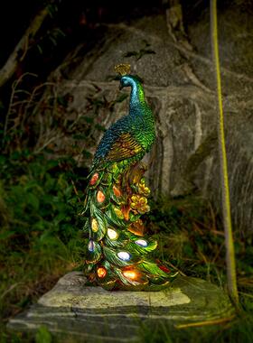 孔雀太阳能小夜布灯户RMJ外林货别墅装饰摆件树脂工艺园品杂阳台