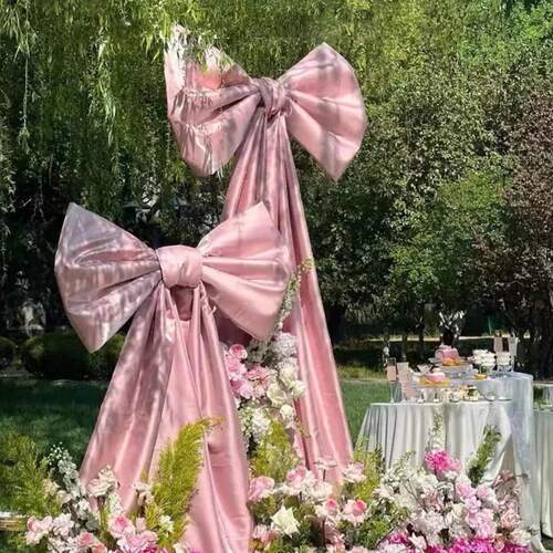 巨型粉色蝴蝶结生日派对背景装饰