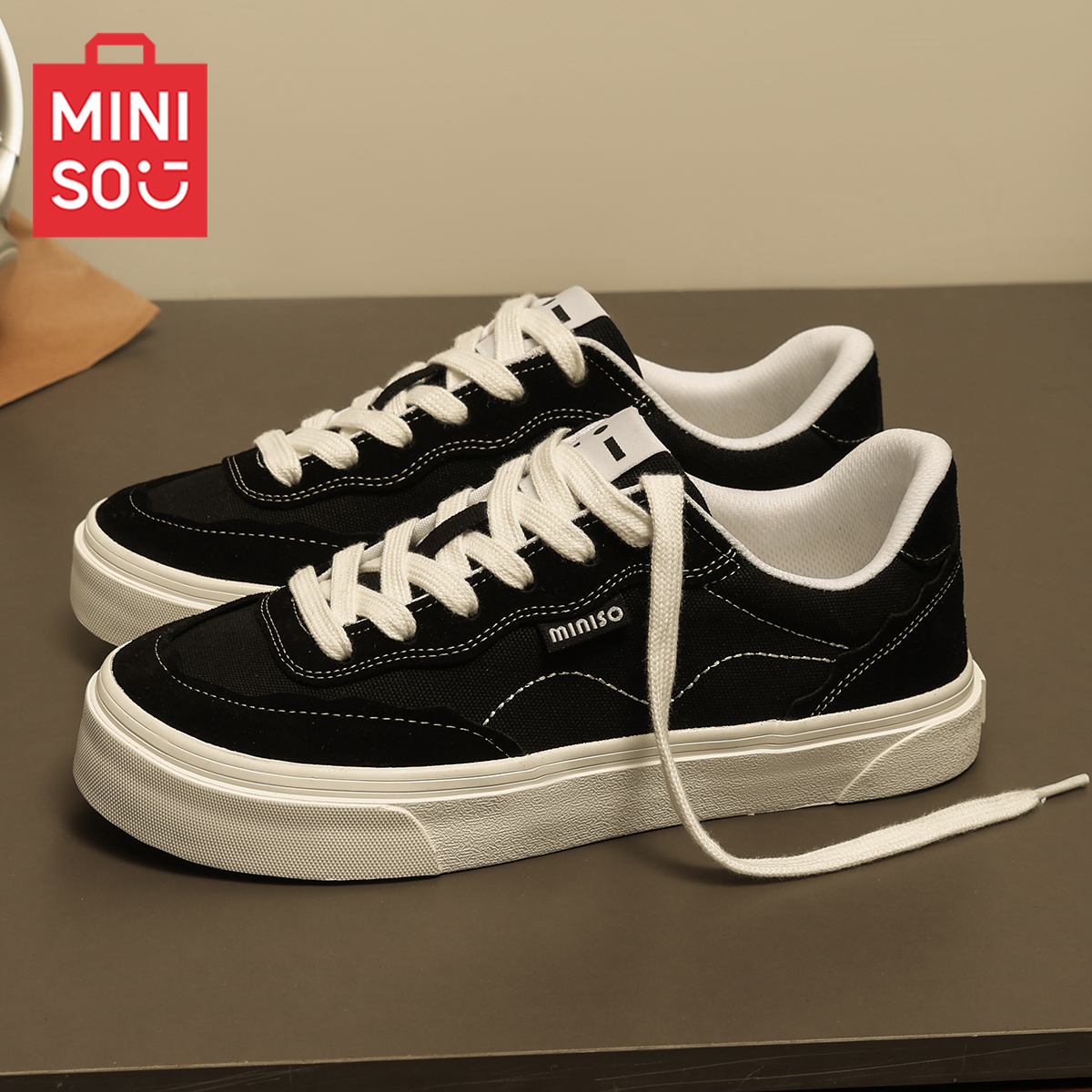 MINISO/名创优品鞋子男黑色运动滑板鞋情侣秋冬款学生休闲帆布鞋
