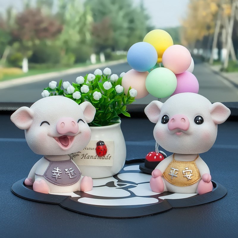车内饰品摇头猪四口爱男女高档创意汽车车载车内装饰品