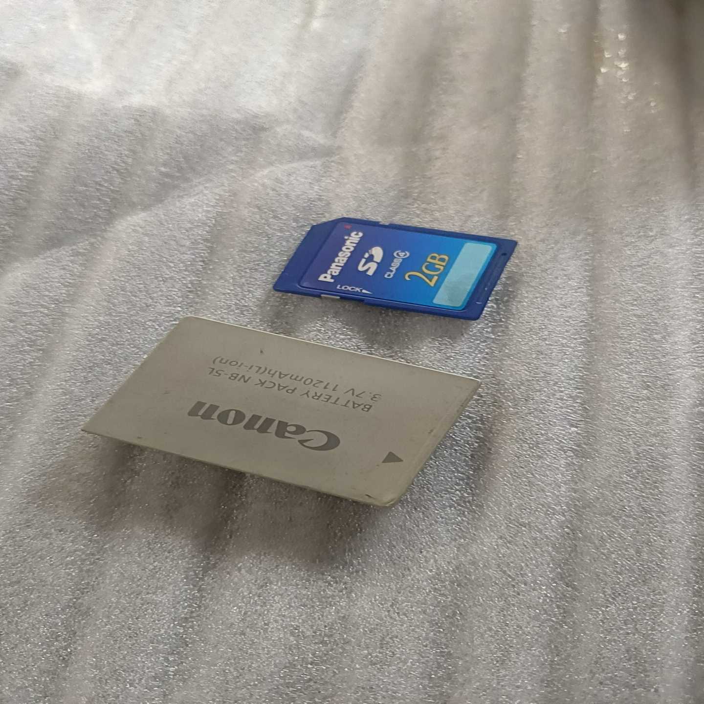 询价~佳能IXUS970IS 1000W像素 5倍变焦 如图所