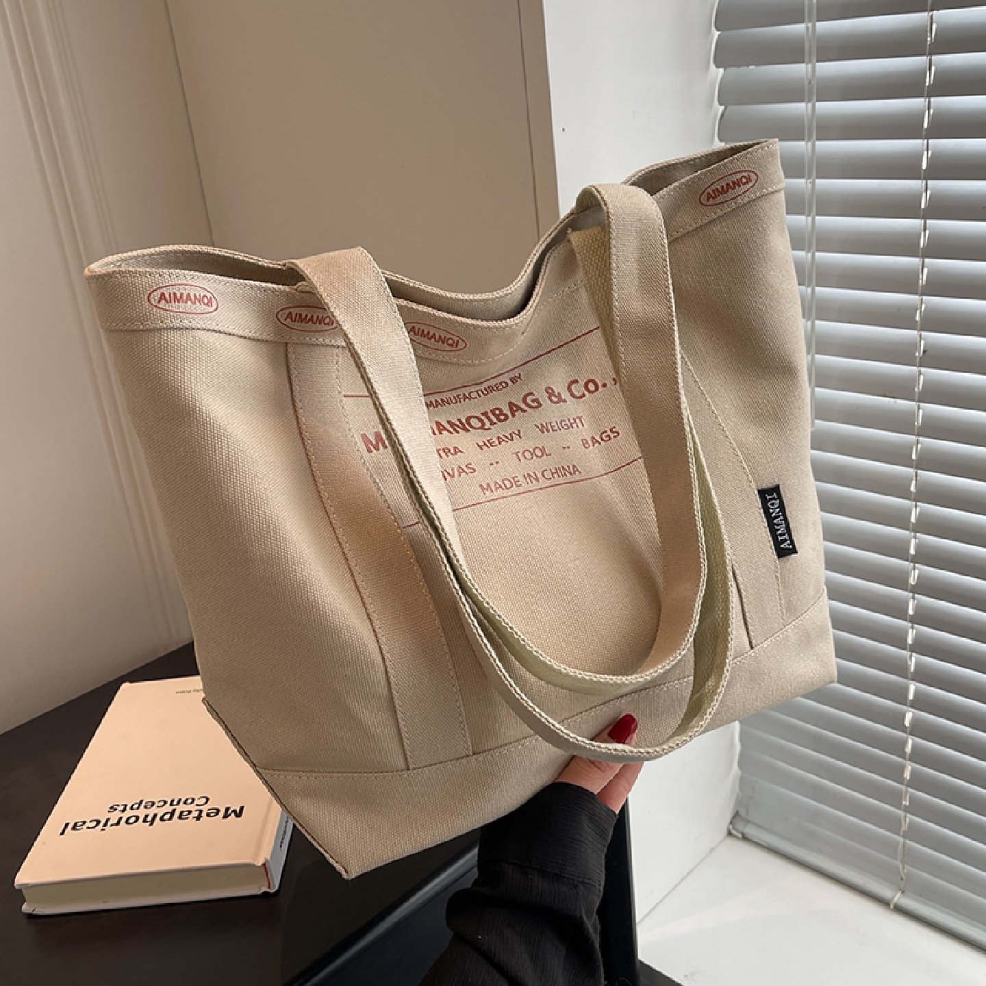 帆布包女2025新款慵懒风大容量手提袋通勤包高级感百搭单肩托特包