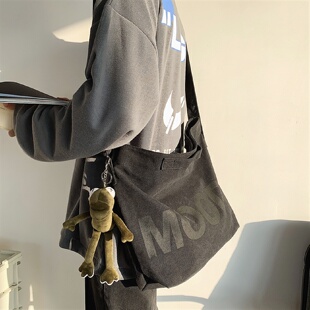 日韩风格大容量帆布斜挎包黑色休闲男用单肩包可折叠帆布学生背包