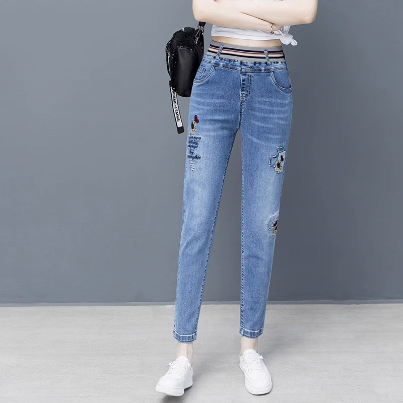牛仔裤女春秋2025新款宽松气质显瘦松紧高腰刺绣九分小脚哈伦裤潮