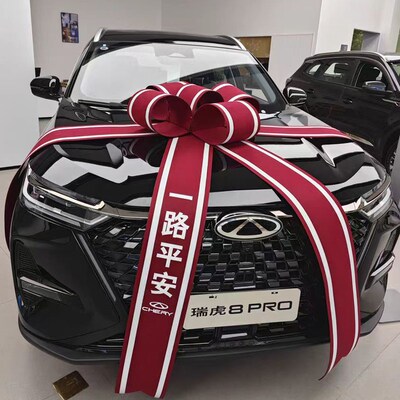 问界交车仪式酒红色大蝴蝶结新车提车F大红花汽车4S店展厅展车装