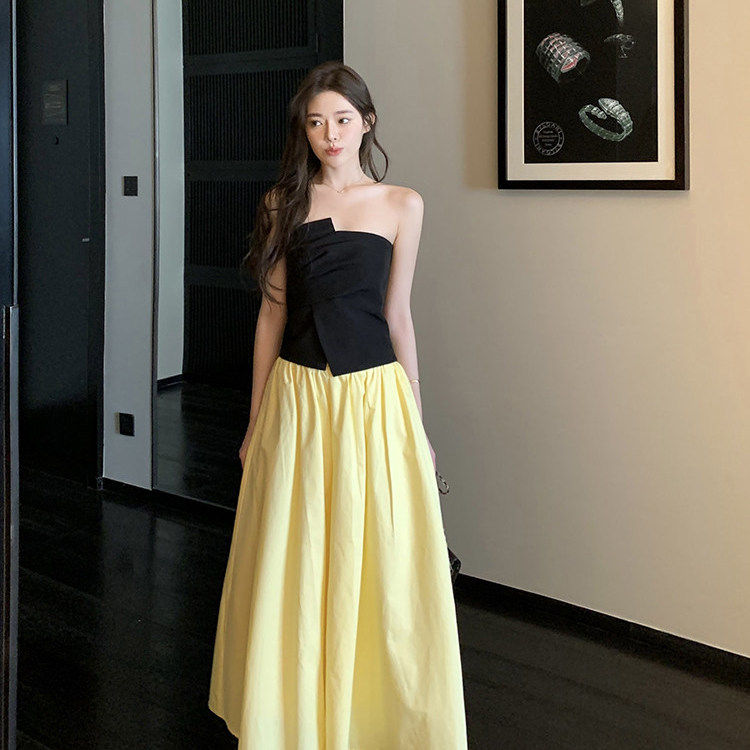 多巴胺鹅黄色A字半身裙女2026夏款高腰显瘦遮胯中长款松弛感半裙