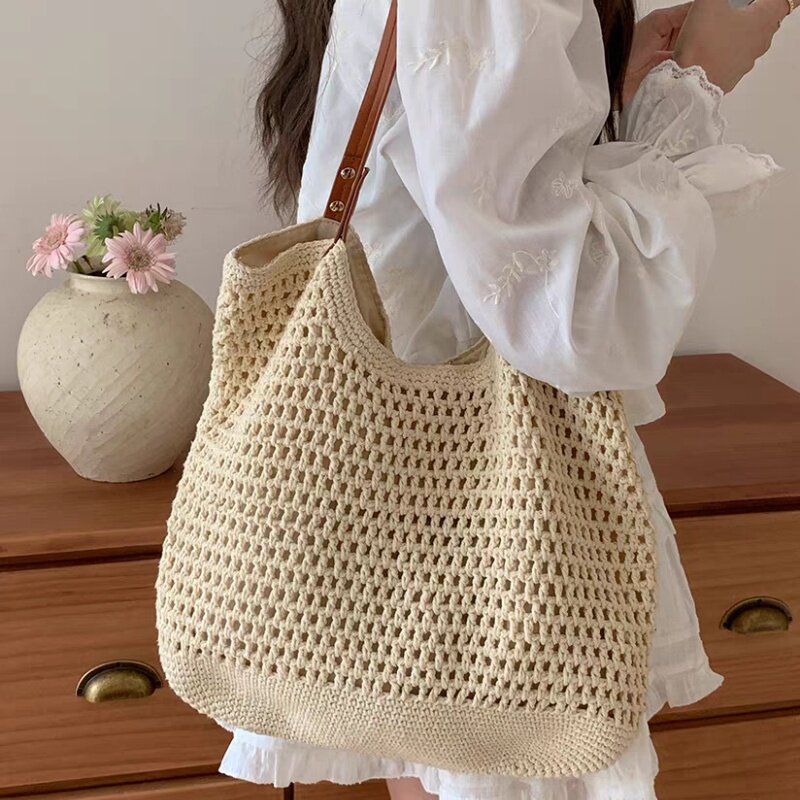 镂空网纹单肩包女2026新款棉线编织学生托特包女大容量海边出游