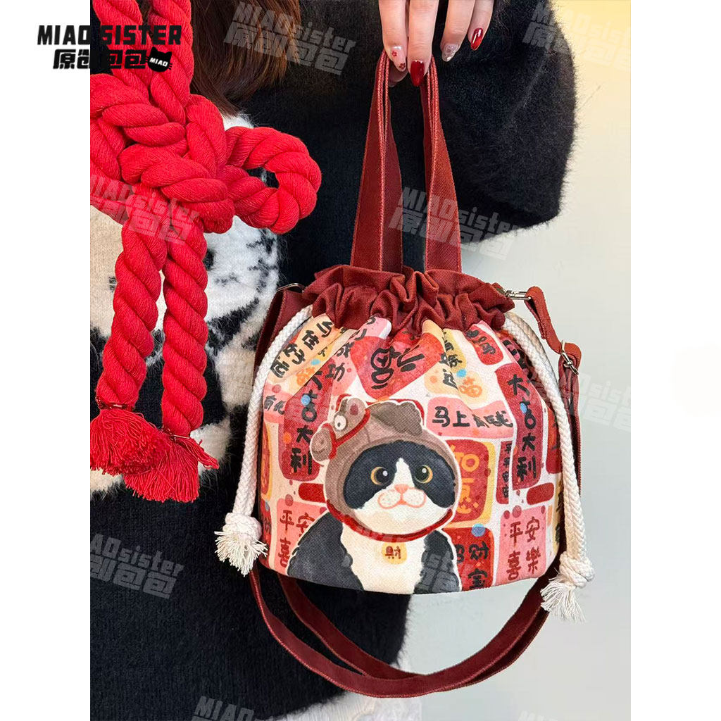 送福小奶牛新年可爱红色抽绳款可斜挎包高颜值便携百搭手提束口包