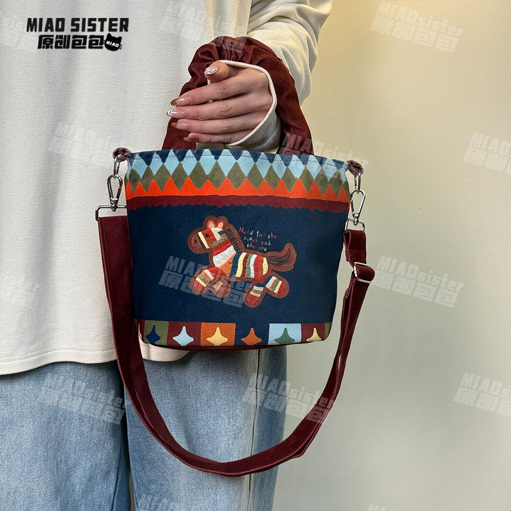 星辰小马蓝可爱复古日常褶皱手拎水桶包可斜挎可单肩妈咪包包新