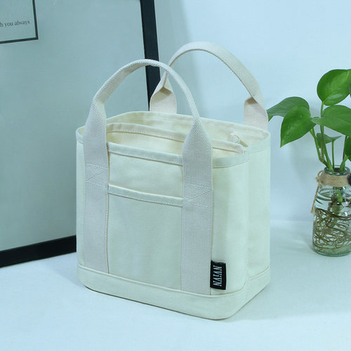 新款时尚白色上班手提小帆布x包定制学生日韩版手拎便当水桶布袋