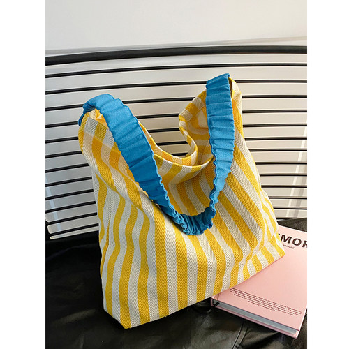 糖果色包包女大容量大学生上课包帆C布包垃圾袋通勤单肩腋下水桶