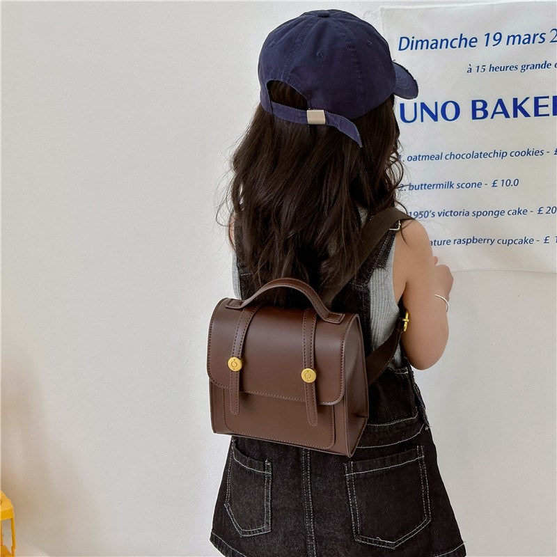 儿童书包新款时尚英伦复古双肩包纯色简约幼儿园男女宝宝外出背包