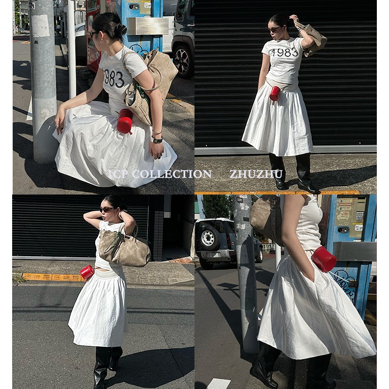 1CP 黑色设计感拼接空气腰半身裙女2025L夏季新款白色百搭A字中裙