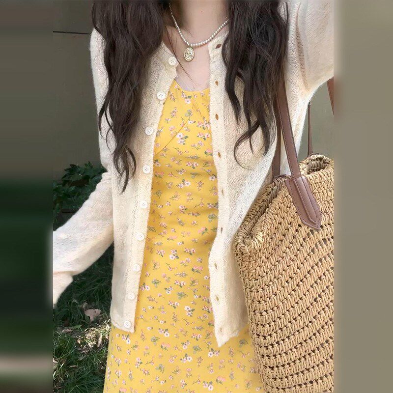 法式气质黄色无袖碎花连衣裙子女夏季2025新款小个子海边度假长裙