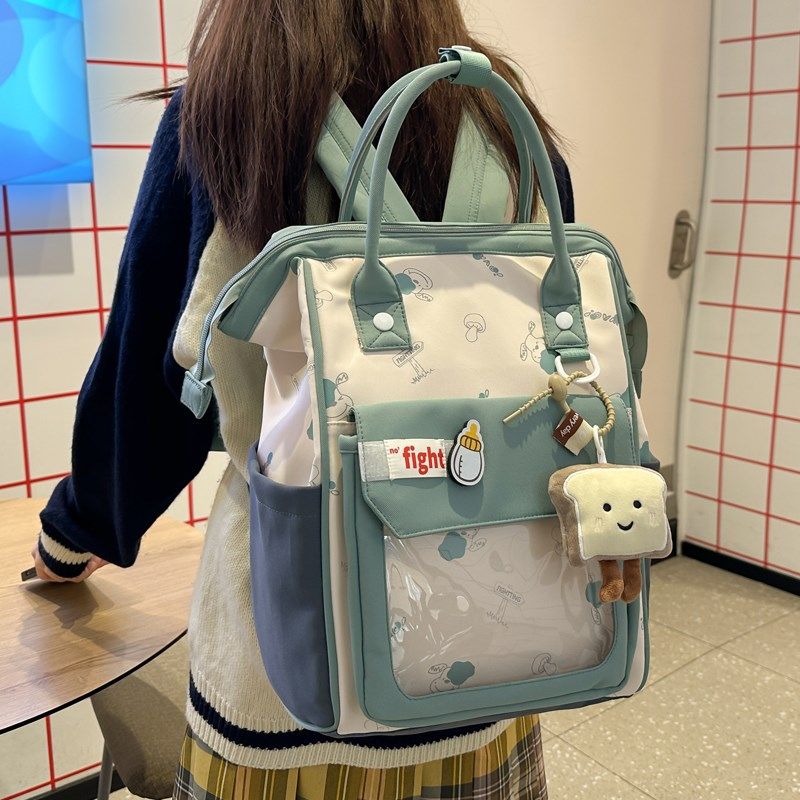 痛包双肩包女高颜值小众不撞款初中高中女生背包日系可爱手提书包