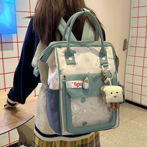 痛包双肩包女高颜值小众不撞款初中高中女生背包日系可爱手提书包