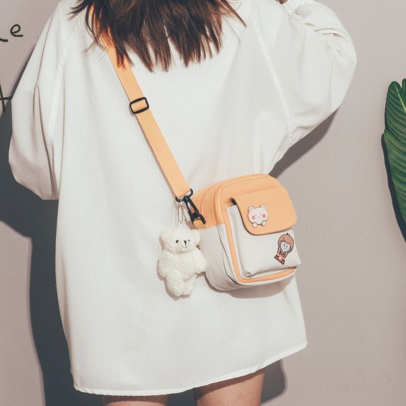 小女孩斜挎帆布包儿童包包女可爱零钱包2022新款十岁女童外出挎包