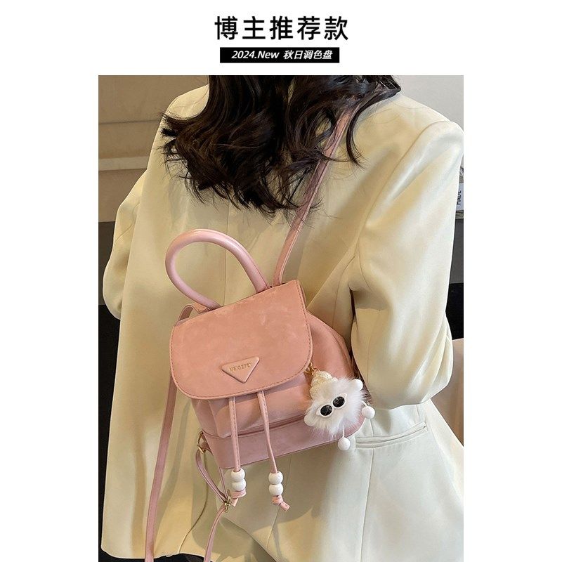 双肩包女生2025新款时尚设计感小众迷你小型轻便白色可爱逛街背包