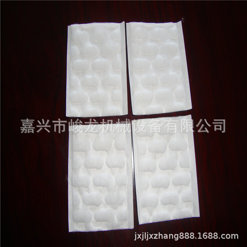 嘉兴峻龙 全自动多规格方片压花压边卸妆棉 化妆棉片裁片机械设备