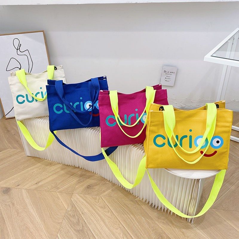 韩版儿童帆布手提包低年级小学生课后补习袋男女童大容量斜挎包潮