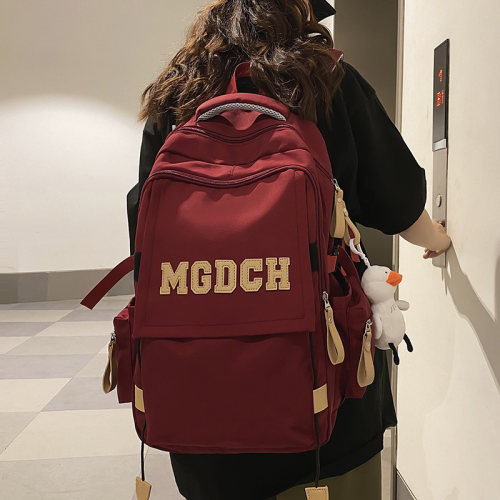 减负大容量书包初中女生小学生双肩包高中生大学生百搭旅行背包男