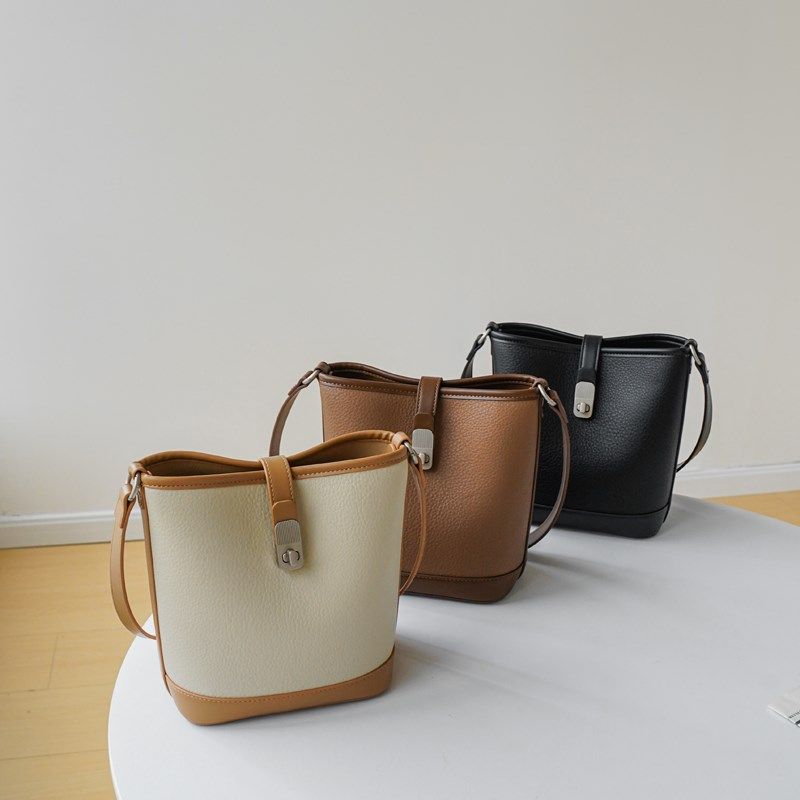 小众设计包包女2024新款高级感精致撞I色水桶包通勤百搭手提单肩,箱包皮具/热销女包/男包,水桶包,淘宝优惠券,粉丝福利购,淘宝优惠卷