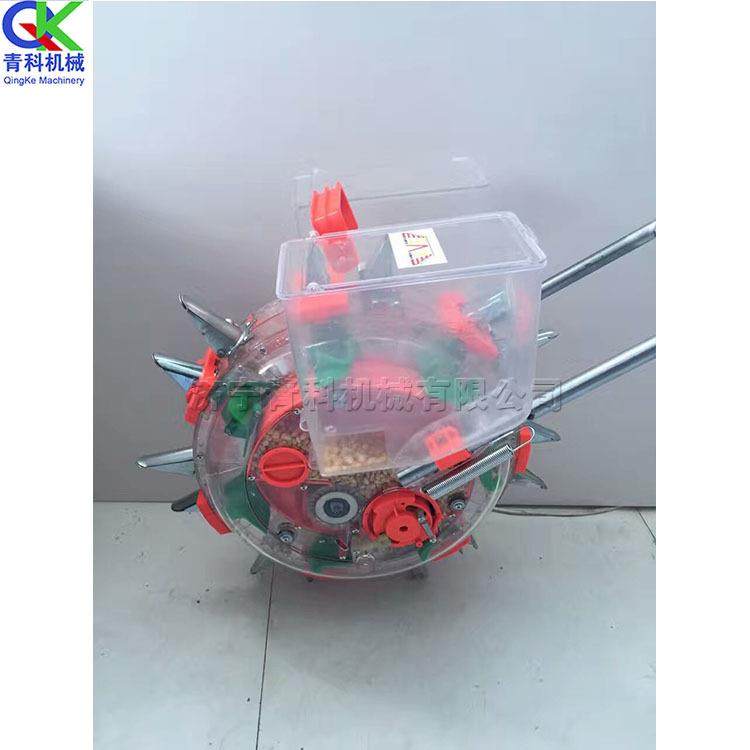 手推式滚轮播种机小型农用梯田山坡播种机小颗粒勺式点播机,农机/农具/农膜,播种栽苗器/地膜机,淘宝优惠券,粉丝福利购,淘宝优惠卷