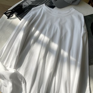 卷边白色长袖T恤女春季u韩版宽松慵懒风百搭中长款圆领打底衫