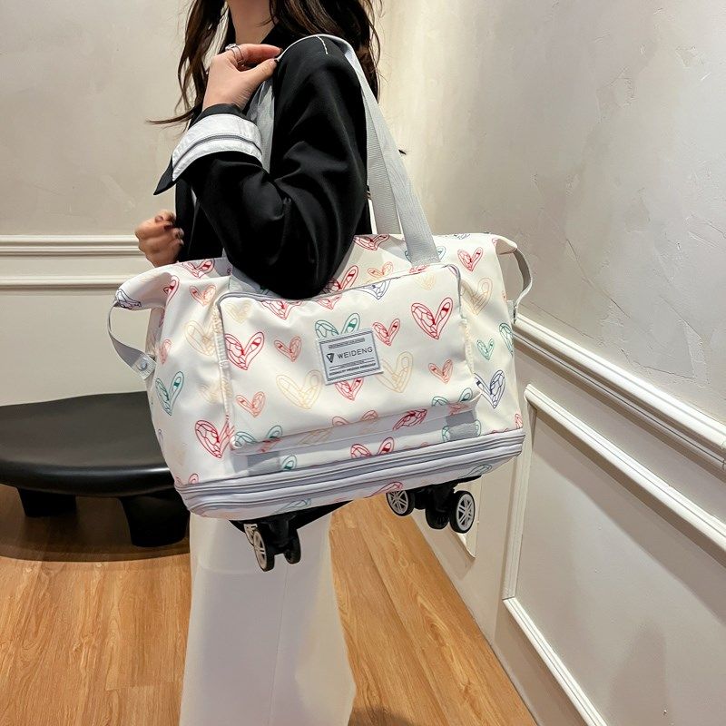 带轮子滑轮旅行包大容量行李箱收纳袋有静音万向轮可折叠手提背包