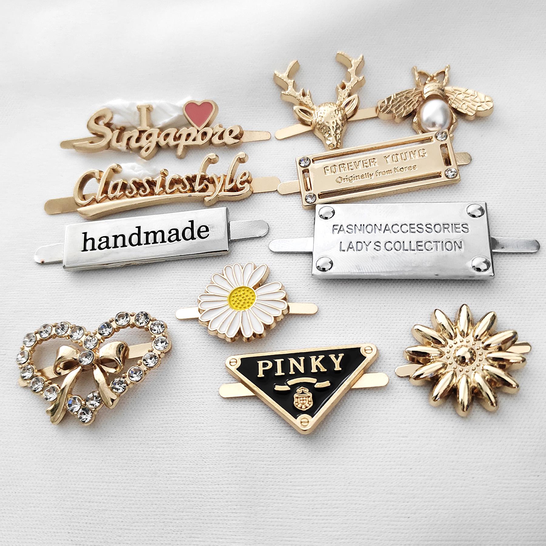 采购产品五金扣袋配件编织袋手工DIY字母金属标志鞋扣鞋花帽子服