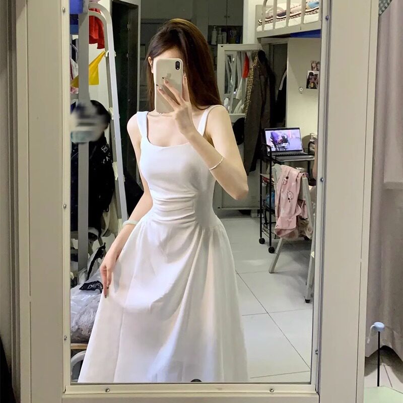 白色吊带连衣裙2024女新款夏季a字裙法式收腰设计感蓬蓬裙长裙子