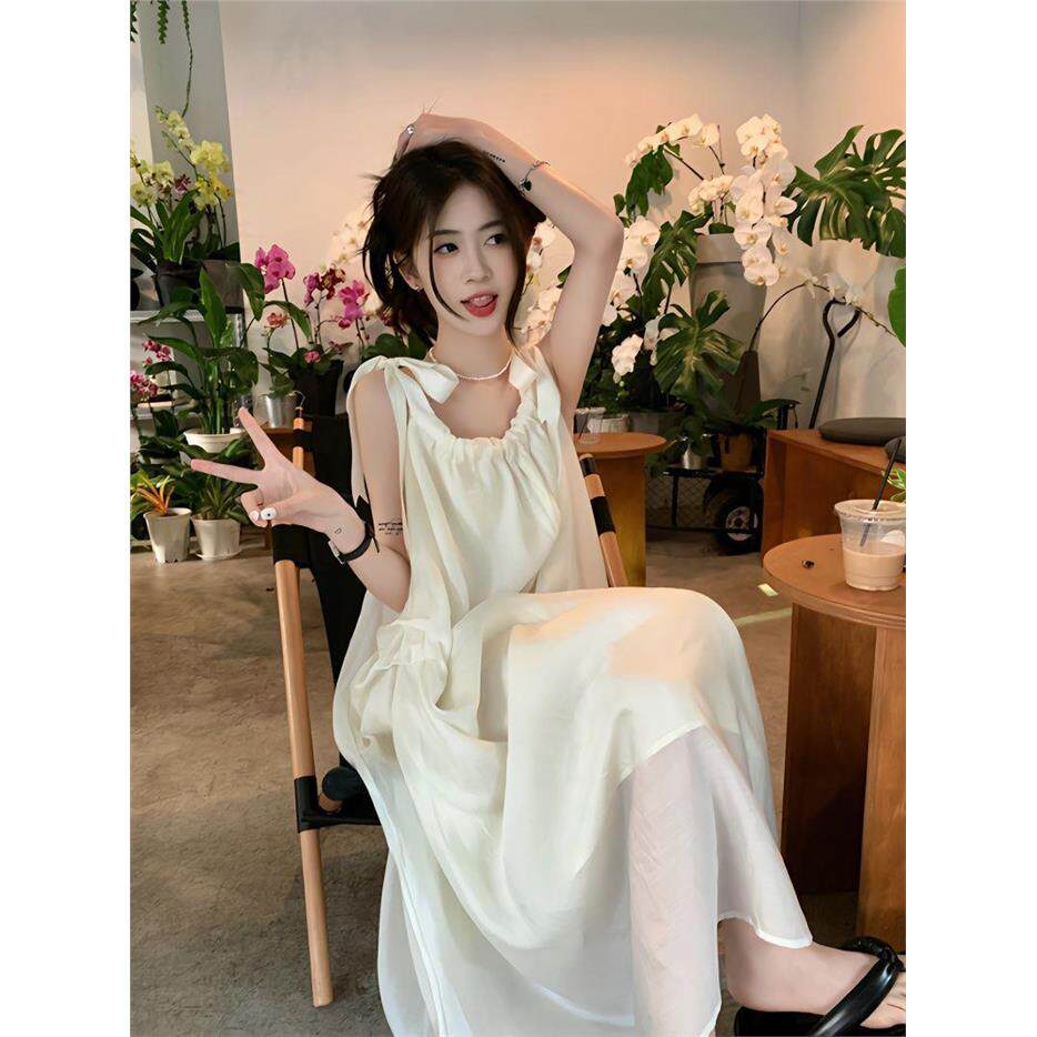夏季甜美2026新款显瘦时尚温柔风米白色中长款吊带连衣裙女装chic