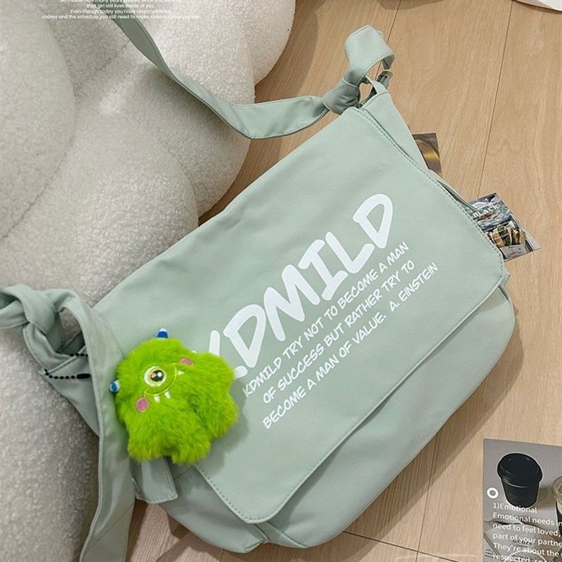 帆布包斜挎包女学生大容量装书字母大学生上课包小众设计补课袋子