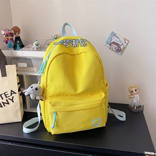 书包新款初高中生大容量轻v便简约纯色双肩包女大学生男旅游背包