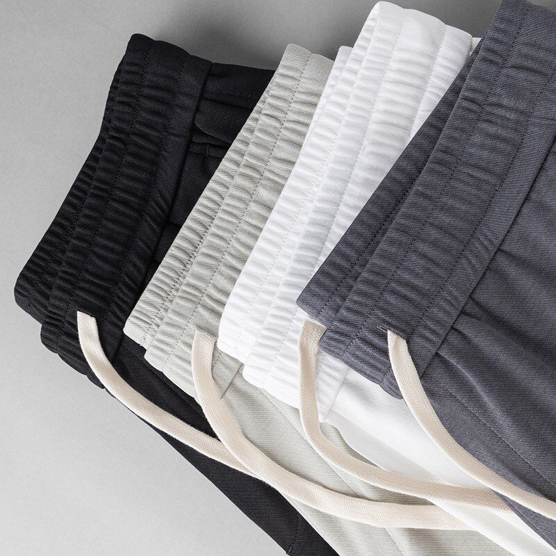 春夏薄款男士休闲裤男款束脚九分卫裤男直筒宽松速干运动冰丝裤子