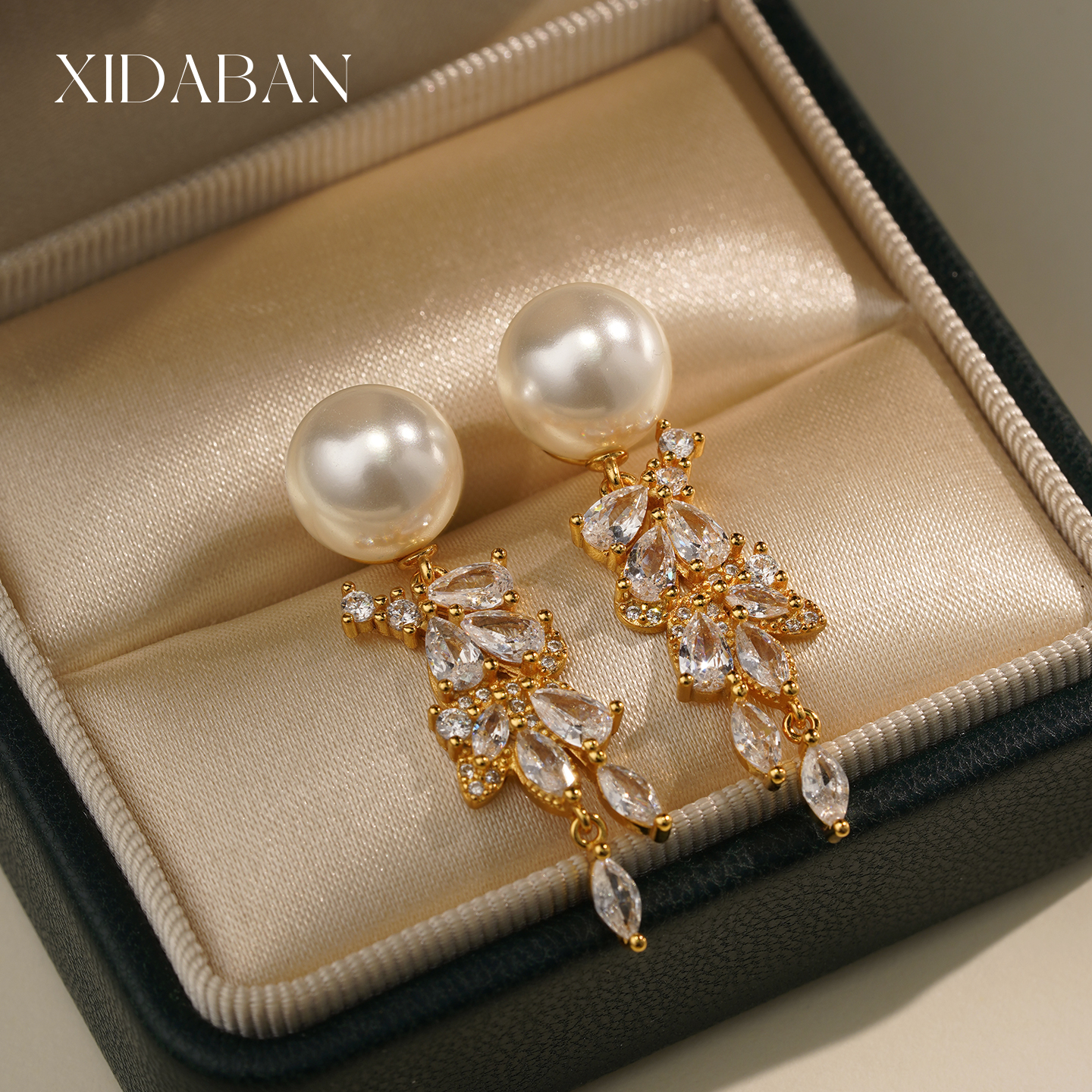 西大班精工纯银雀翎澳母贝珠耳环