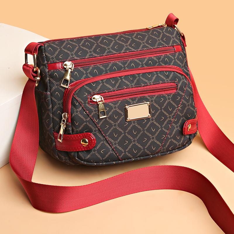 新品中老年人包包女包多口袋单肩斜挎包简约大气中年女士小背包斜