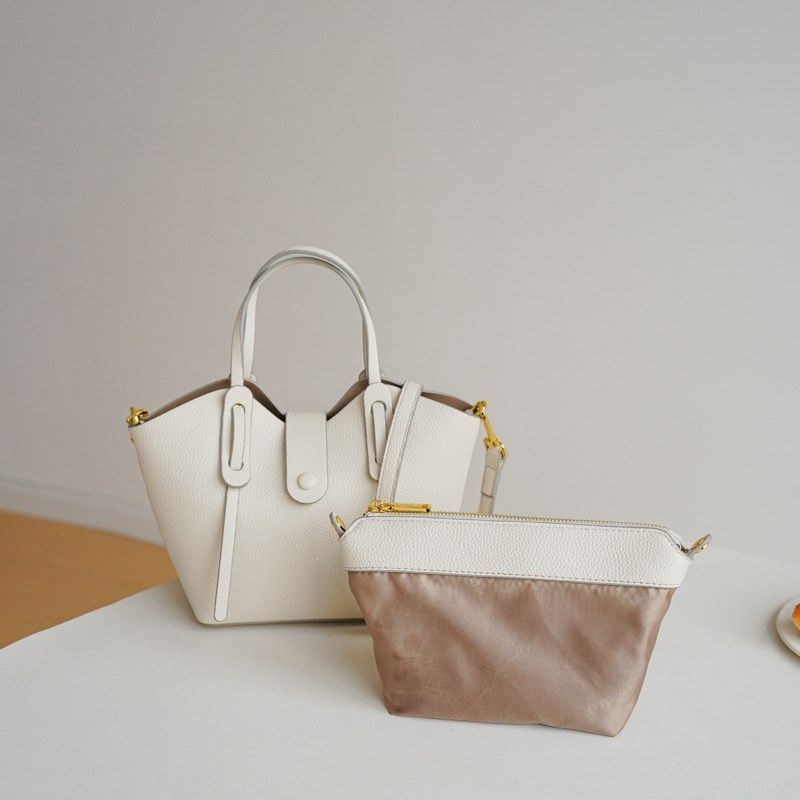 小众设计包包女2024新款简约百搭手提翅膀L包高级质感菜篮子水桶,箱包皮具/热销女包/男包,水桶包,淘宝优惠券,粉丝福利购,淘宝优惠卷