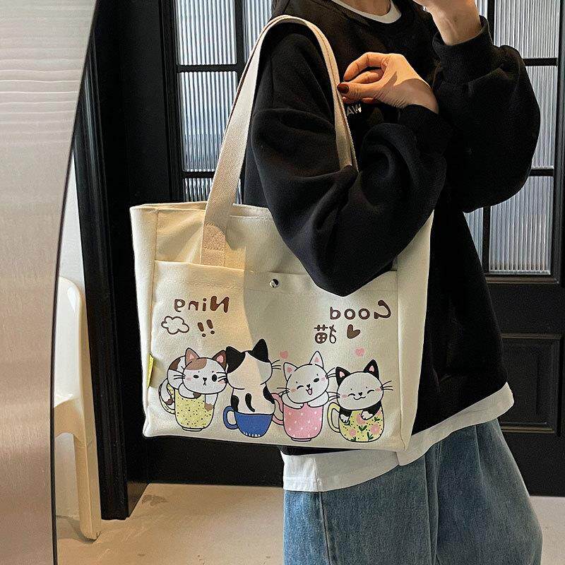 新品休闲大容量帆布包包女2025新款潮时尚手提袋通勤托特包上课单