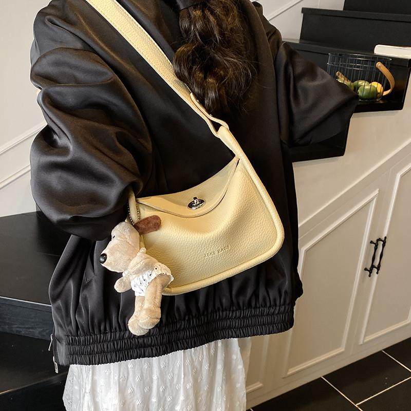 新品夏天黄色超火枕头包包女式2025新款高级感轻奢小众设计单肩斜