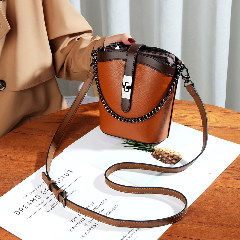 真皮斜挎手提小包包手机包女气质2023软牛皮竖款迷你水桶包放手机