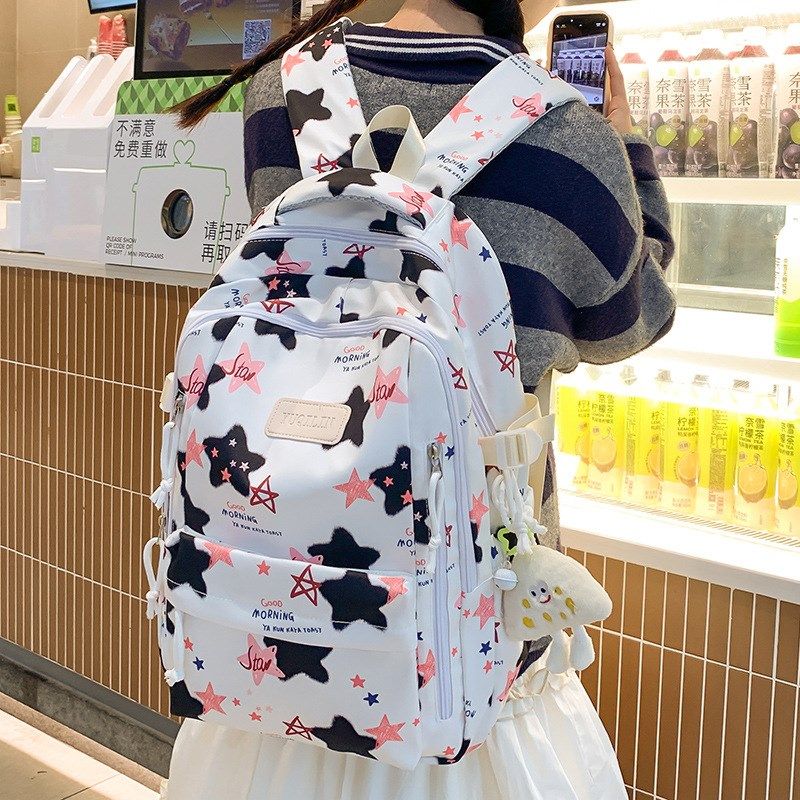 新款初高中学生书包m男女大容量双肩包时尚涂鸦印花运动电脑背包