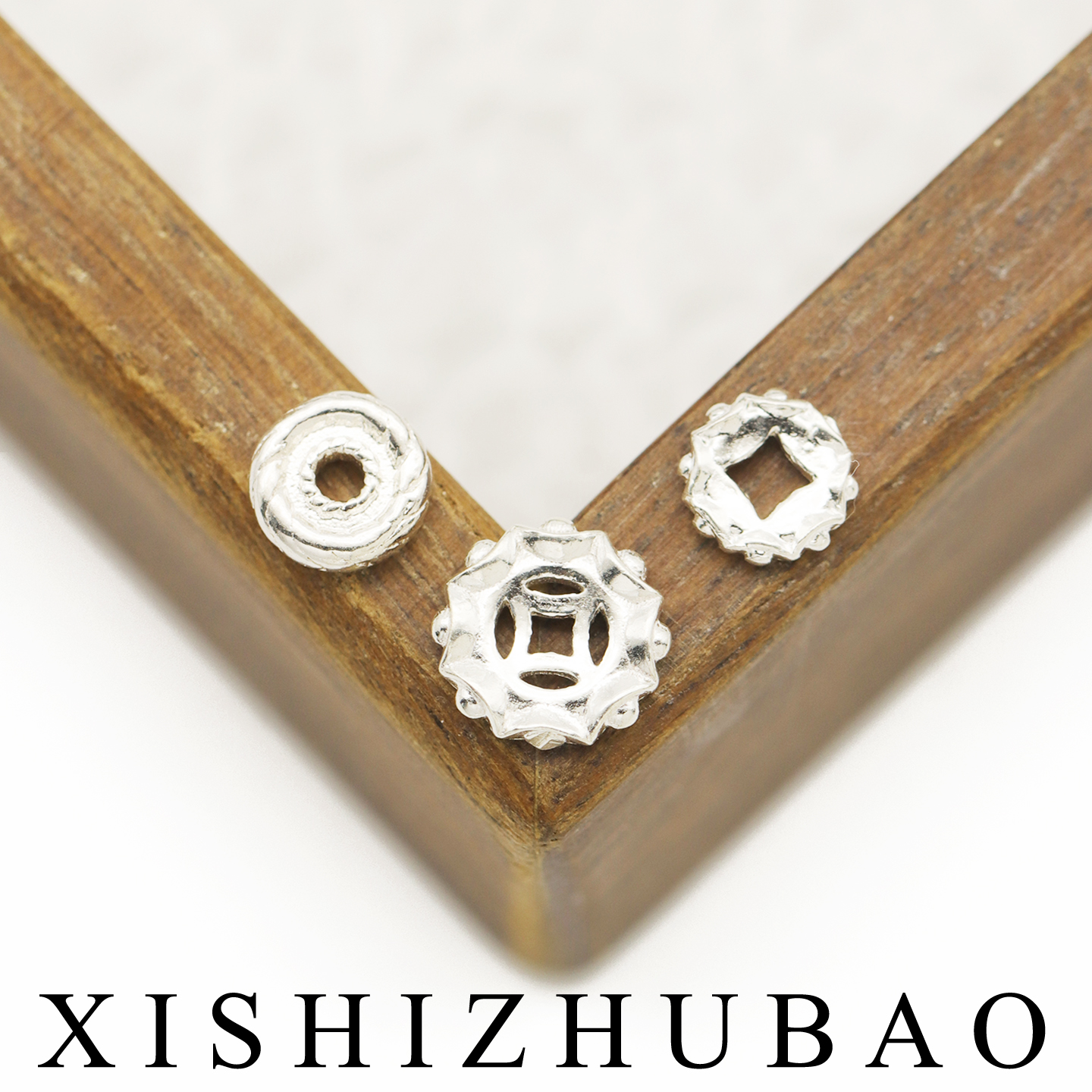 S999纯银螺旋纹元宝边圆形盘缠