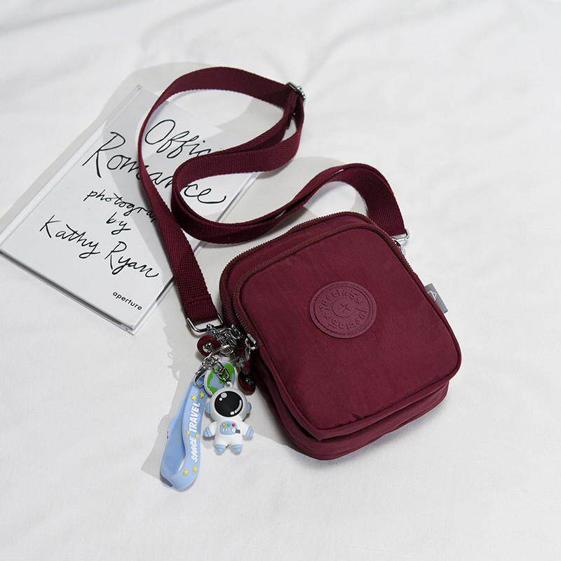 推荐新款手机包女斜挎迷你轻便小包包帆布包潮百搭防水单肩钥匙零