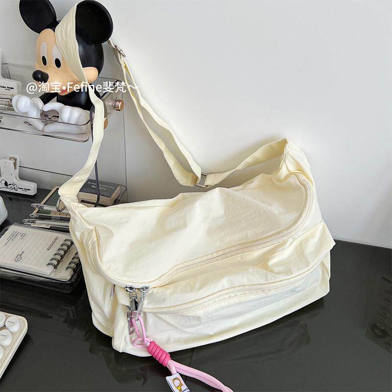 推荐骑行斜挎包轻便大容量学生装书通勤户外运动风胸包日常简约女